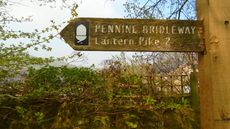A wooden sign marked 