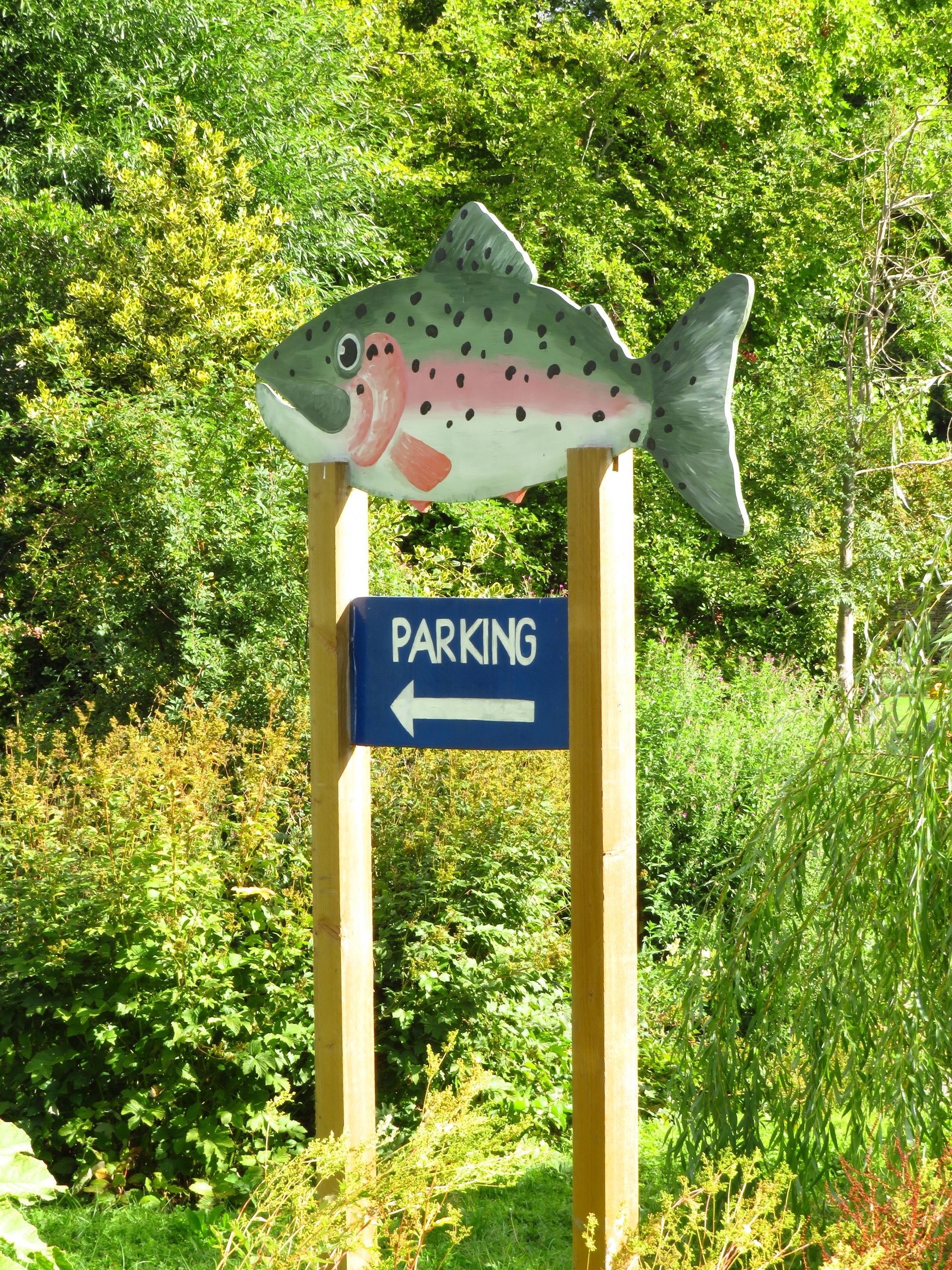 A large blue sign reads 