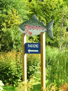 A large blue sign reads 