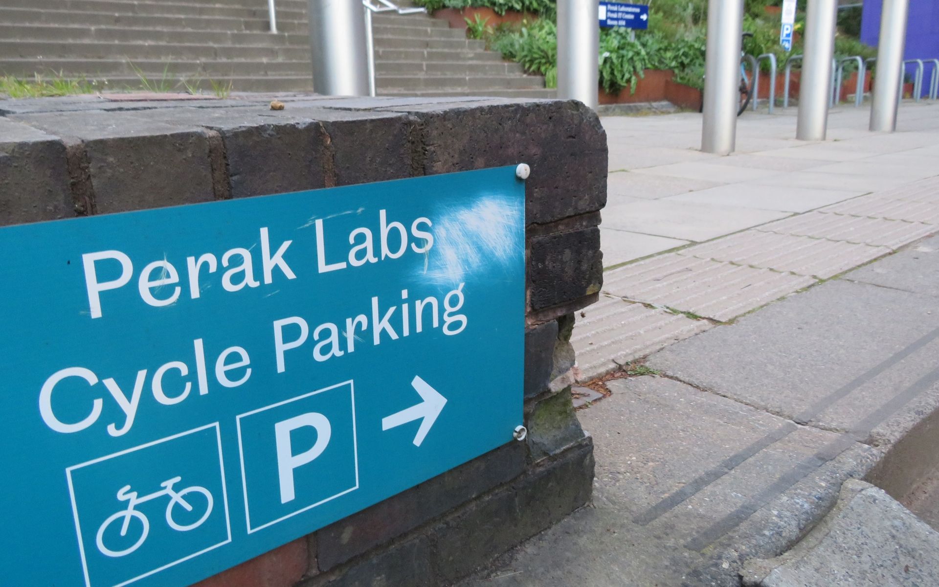 A blue sign reads 