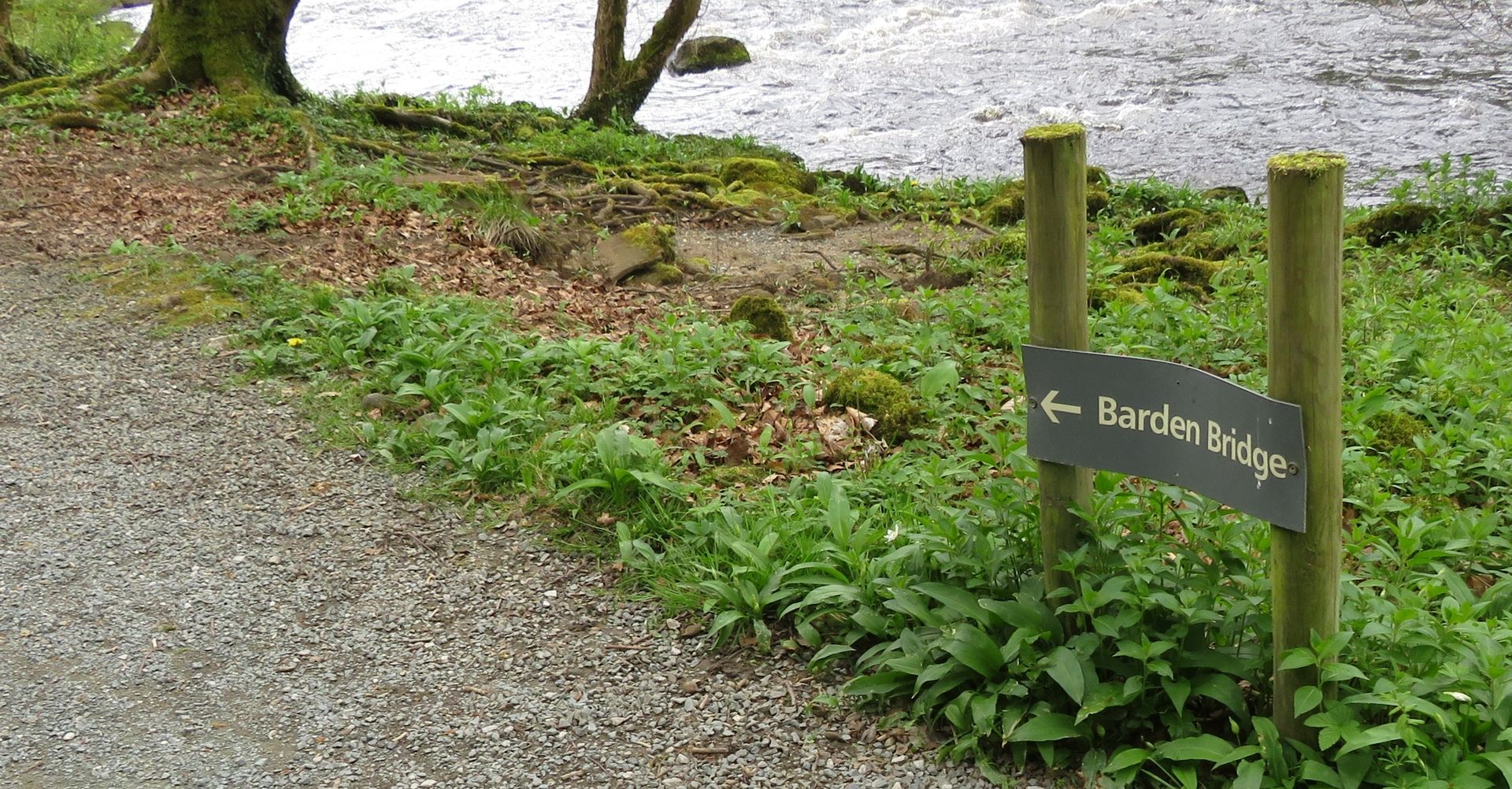 A grey metal sign reading 